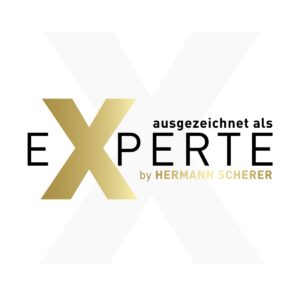 a gold x with black text